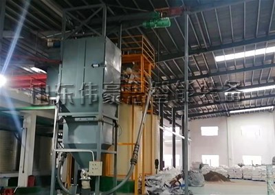 生石灰粉噸包拆包設(shè)備，噸袋拆包機(jī)配套管鏈機(jī)現(xiàn)場(chǎng)